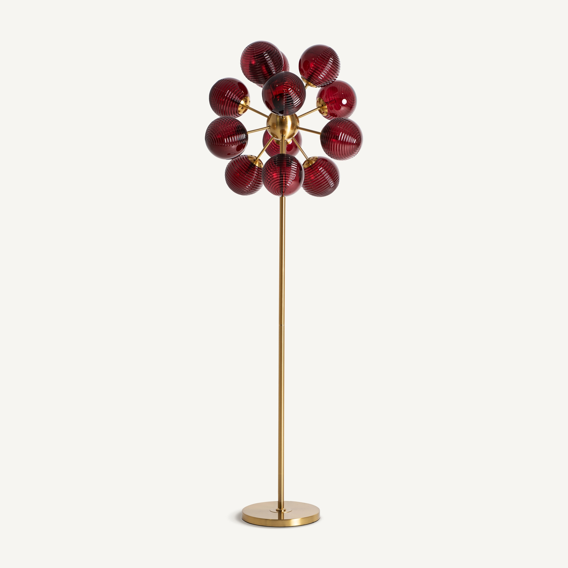 Sculptural floor lamp with clustered burgundy glass globes on a slender gold-toned frame