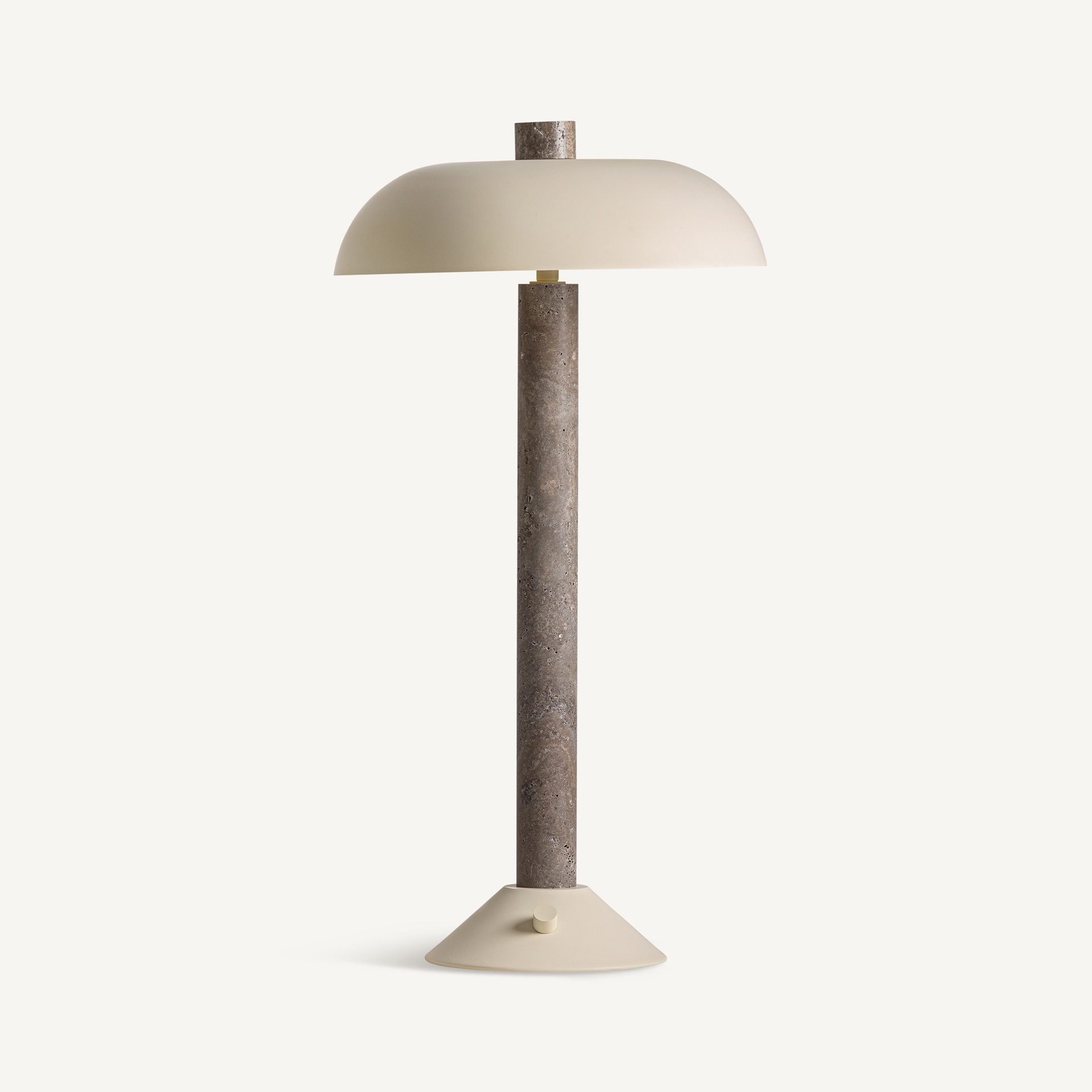 Sculptural marble table lamp with a curved stone base and shallow cream metal shade